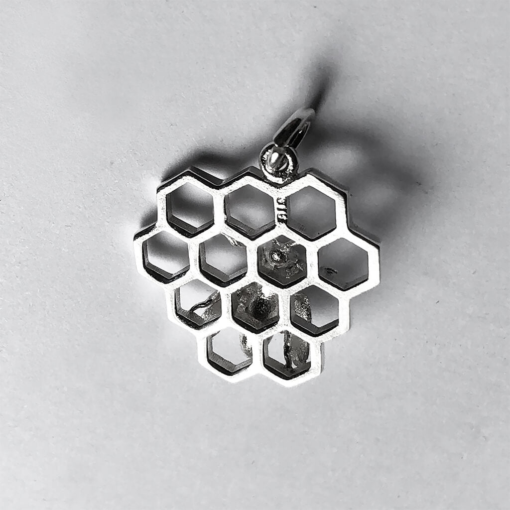 Honey bee on honeycomb charm sterling silver pendant reverse hallmark