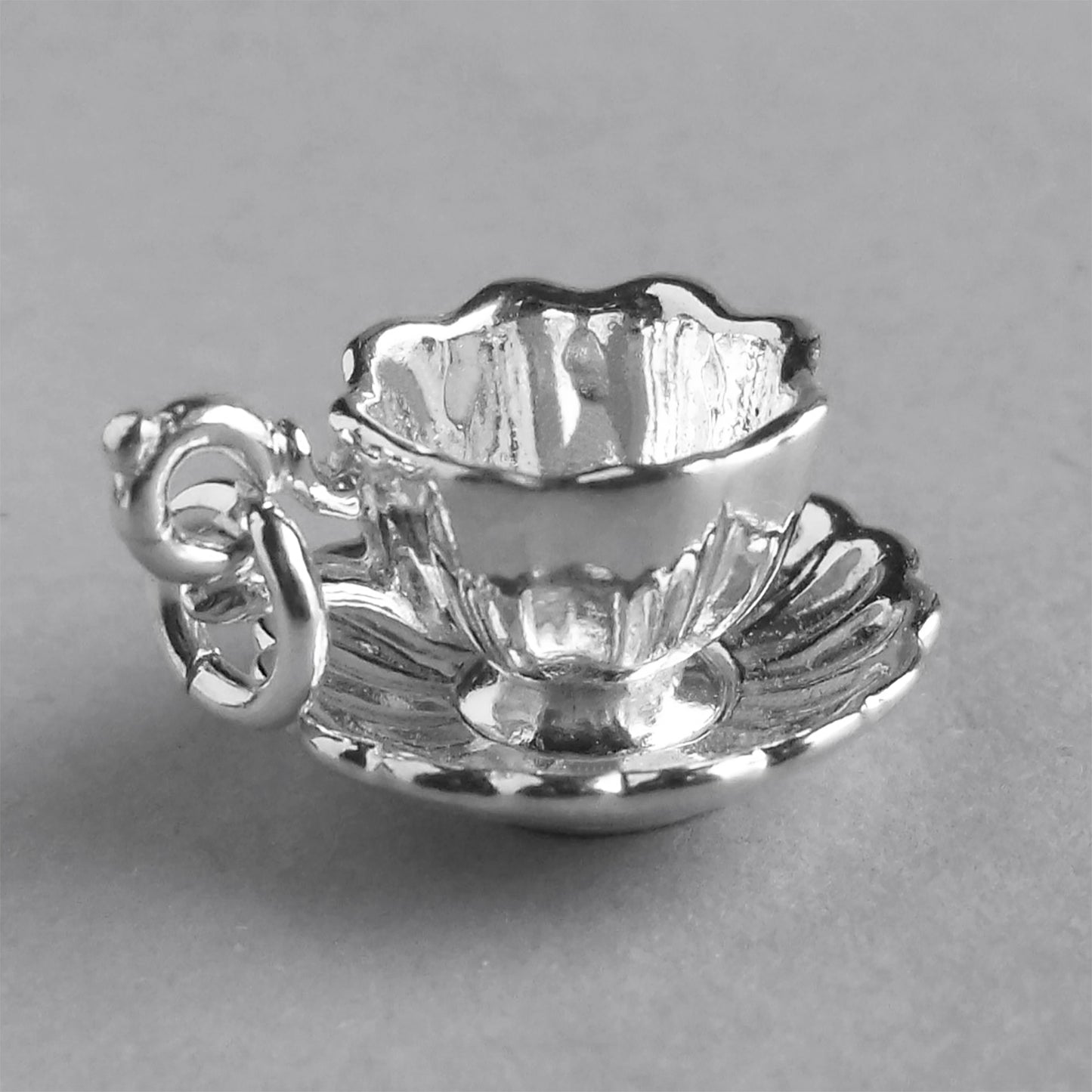 teacup and saucer charm