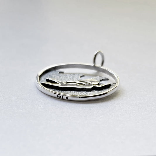 ocean swimmer charm