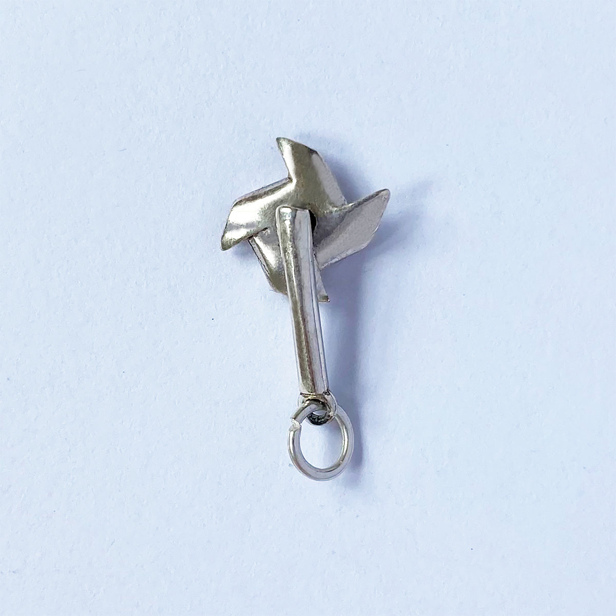 Sterling silver toy windmill charm with moving sails pendant