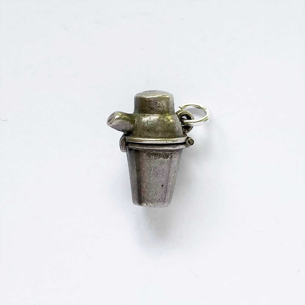 Vintage sterling silver opening cocktail shaker charm with red enamel devil inside pub pendant