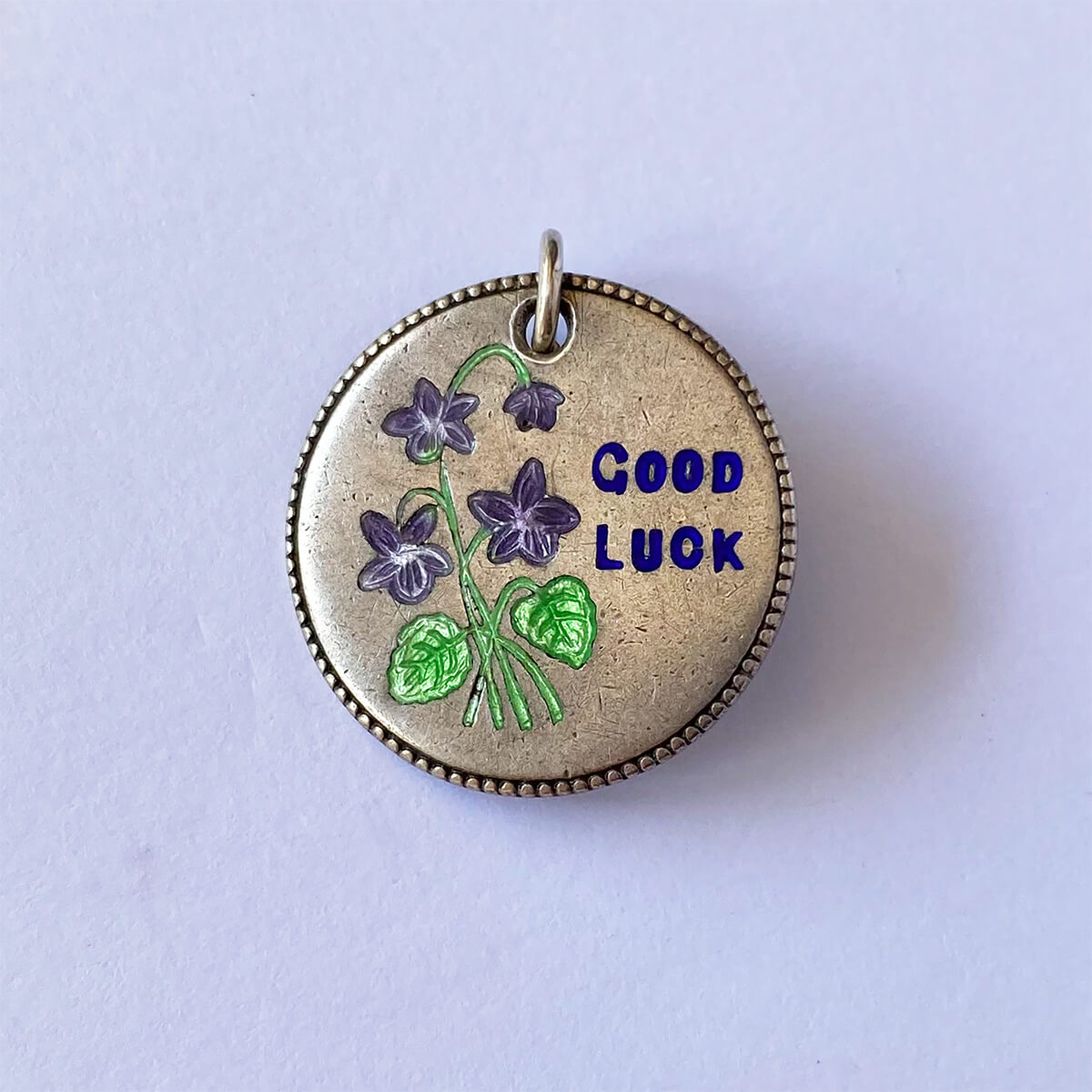 Sterling silver Good Luck violet flower charm from Charmarama