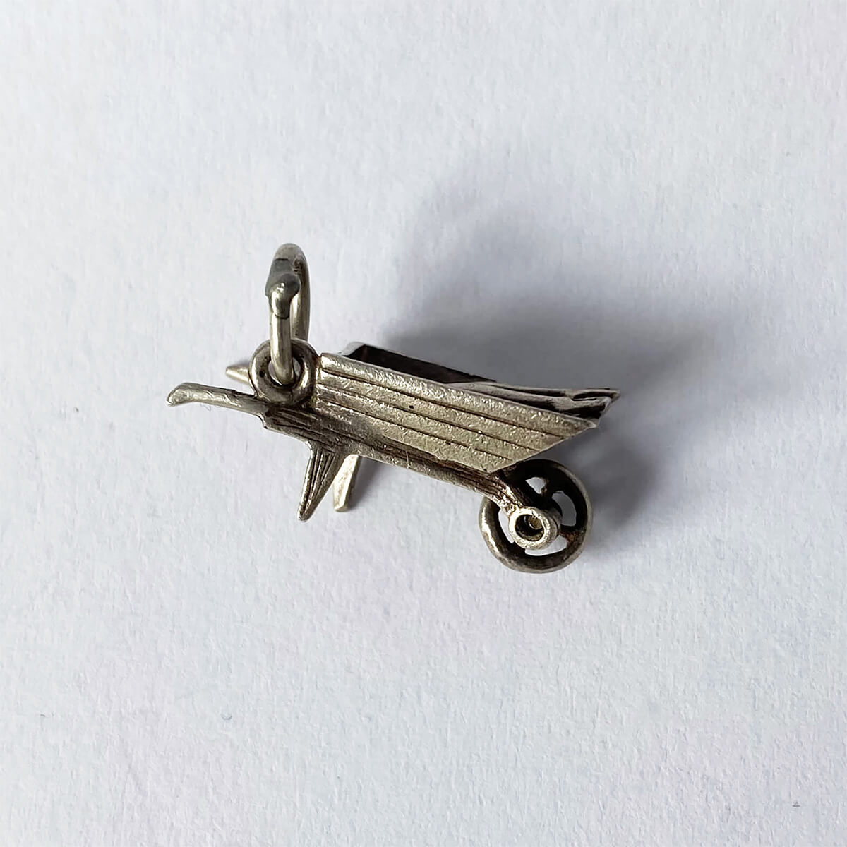 Vintage 1960s sterling silver horticulture wheelbarrow spade and fork charm from Charmarama