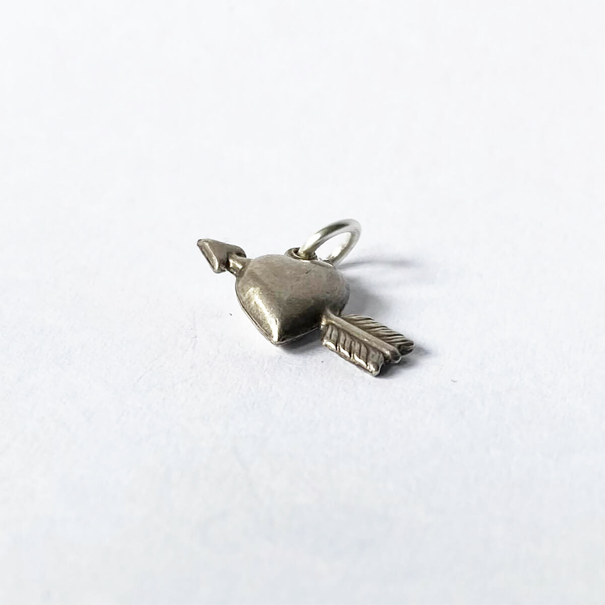 Sterling silver Valentines Day heart and arrow charm from Charmarama
