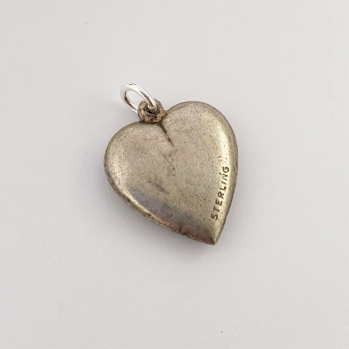 Vintage 1940s sterling silver floral forget-me-not heart charm from Charmarama