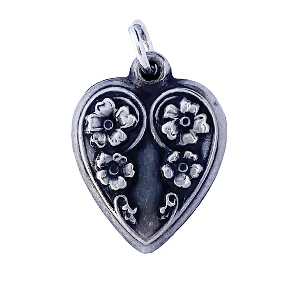 Vintage 1940s puffy heart with floral design charm sterling silver pendant from Charmarama
