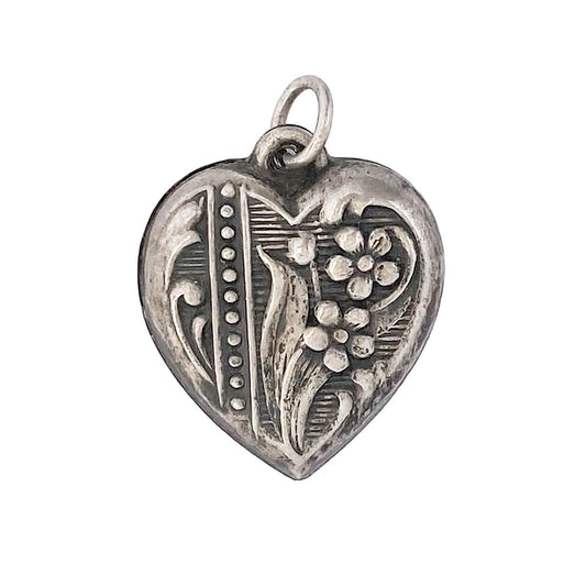 Vintage 1940s puffy heart with floral and dot design charm sterling silver pendant from Charmarama