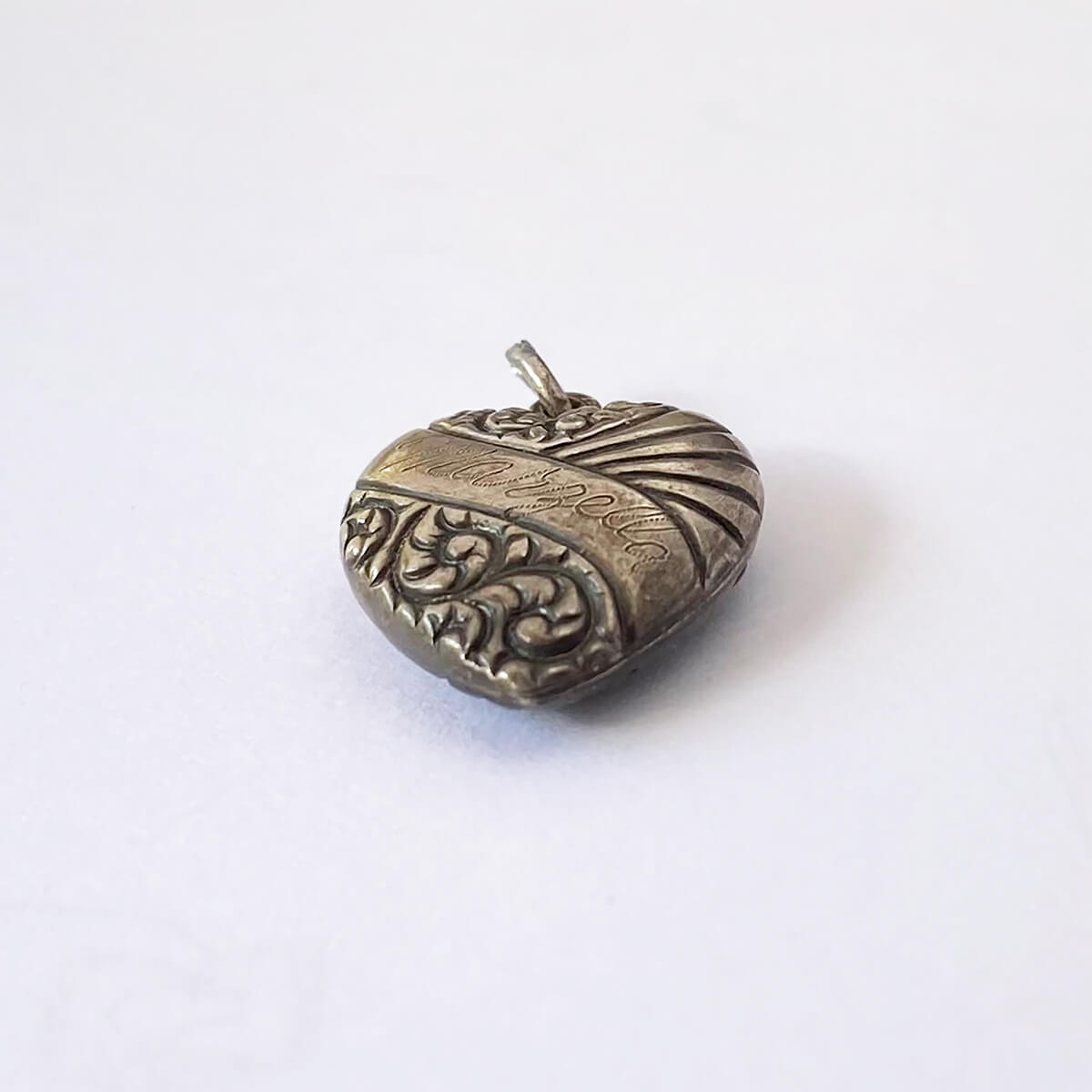 Vintage sterling silver puffed heart charm 1940s engraved pattern