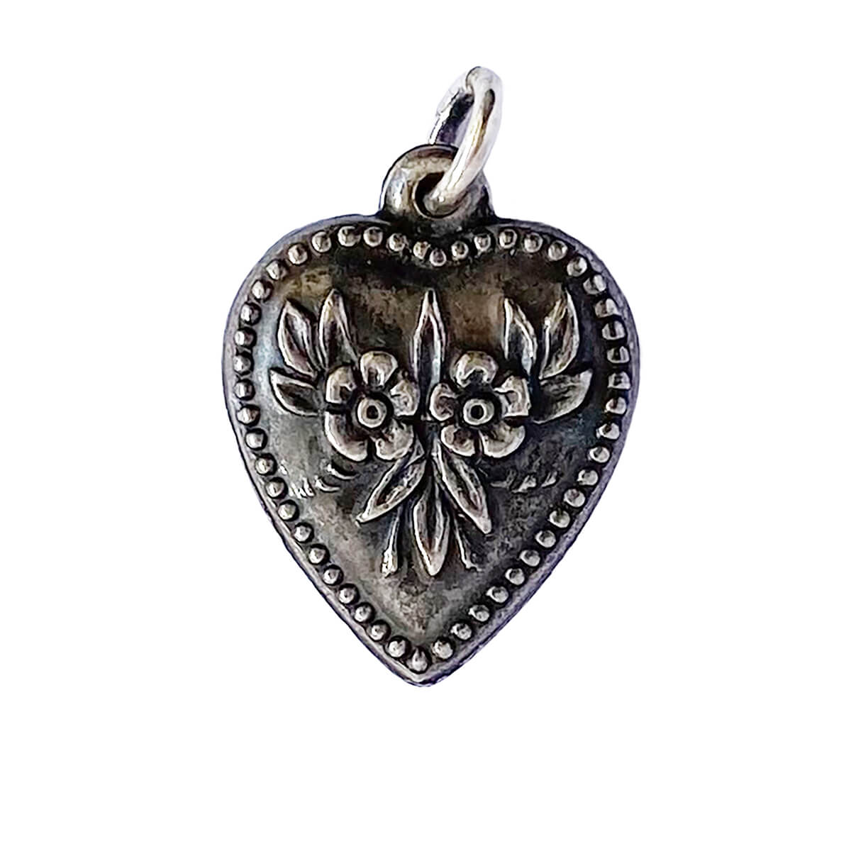 Vintage 1940s puffy heart with floral and dotted frame charm sterling silver pendant from Charmarama