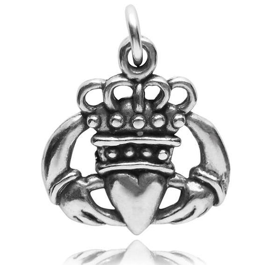 Silver Irish Claddagh hands heart crown symbol charm on white background