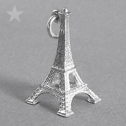 Sterling silver Eiffel Tower charm on a grey background