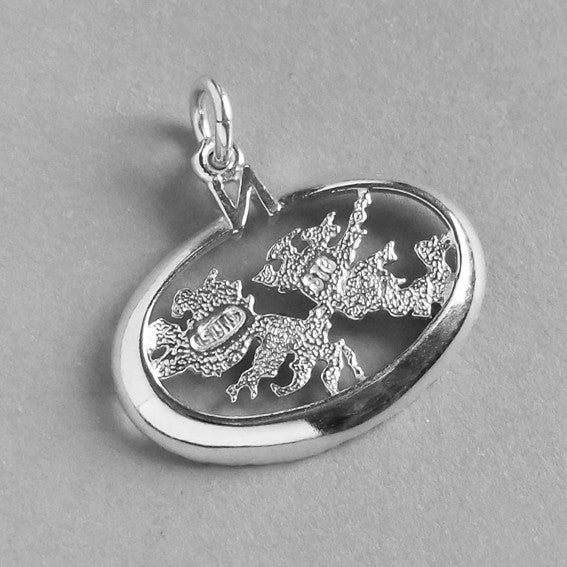 Back of a sterling silver Falkland Islands charm on a grey background