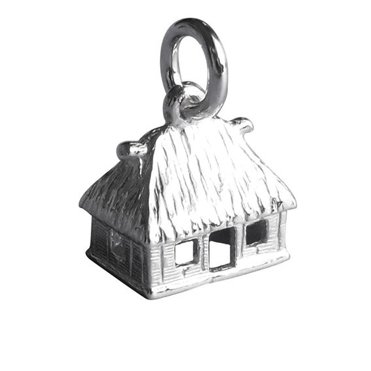 Sterling silver Fijian house charm on a white background