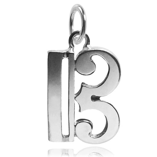 silver alto clef charm on white background