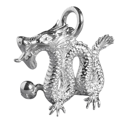 silver Chinese dragon charm on a white background
