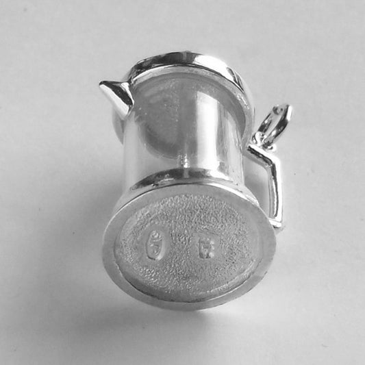 Sterling silver coffee plunger charm on a grey background
