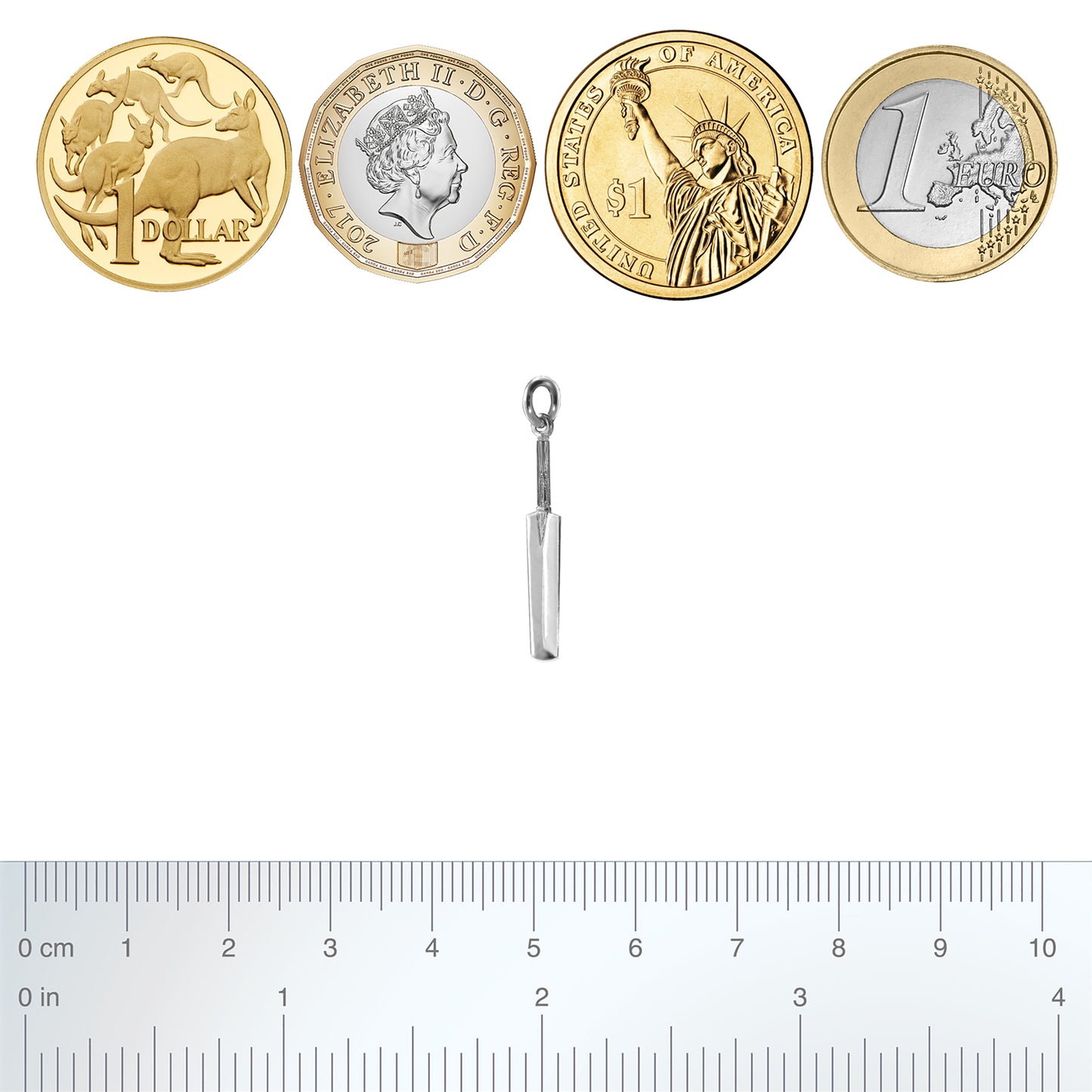 Sterling silver cricket bat charm with coins and ruler for scale on a white background