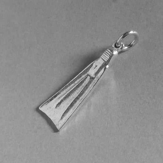 Sterling silver diving fin charm viewed from back on a grey background