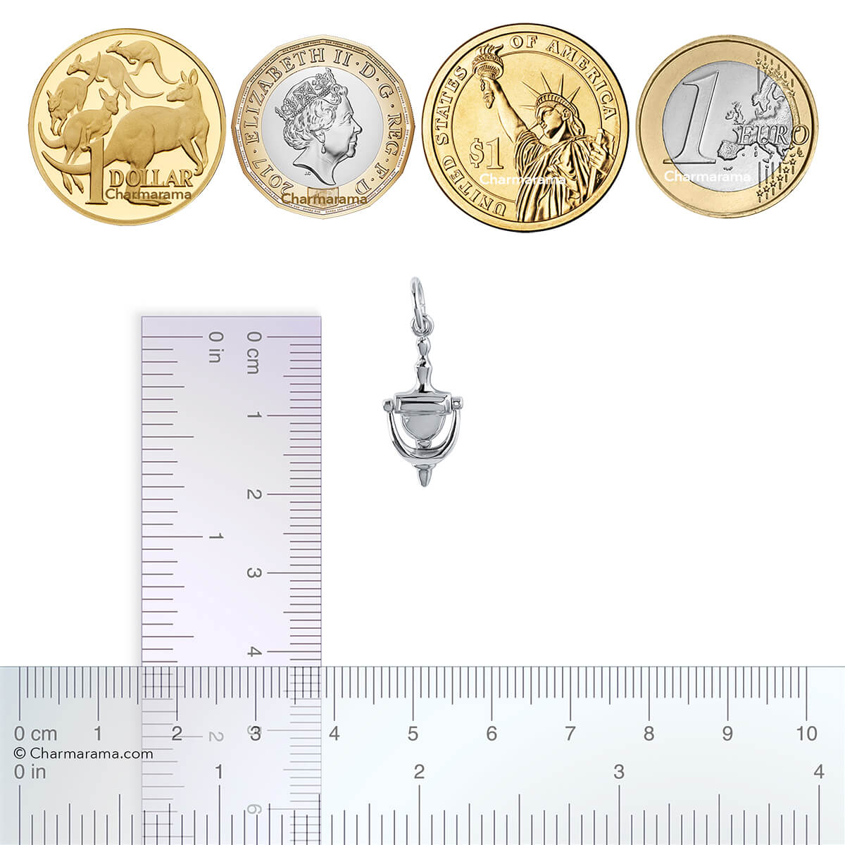 Sterling silver door knocker charm with coins and ruler for scale on a white background