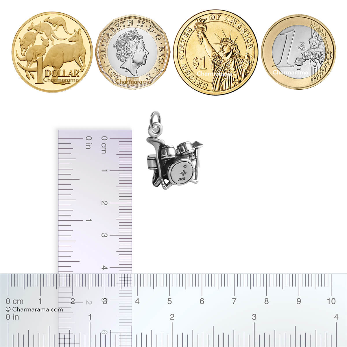 Sterling silver drum kit charm with coins and ruler for scale on a white background