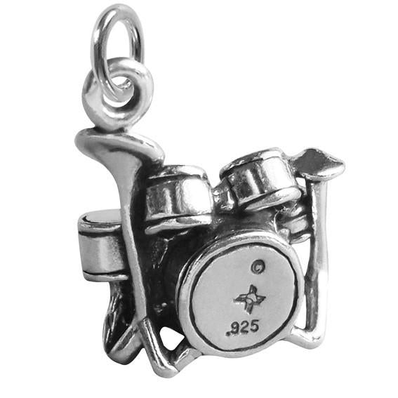 Sterling silver drum kit charm on a white background