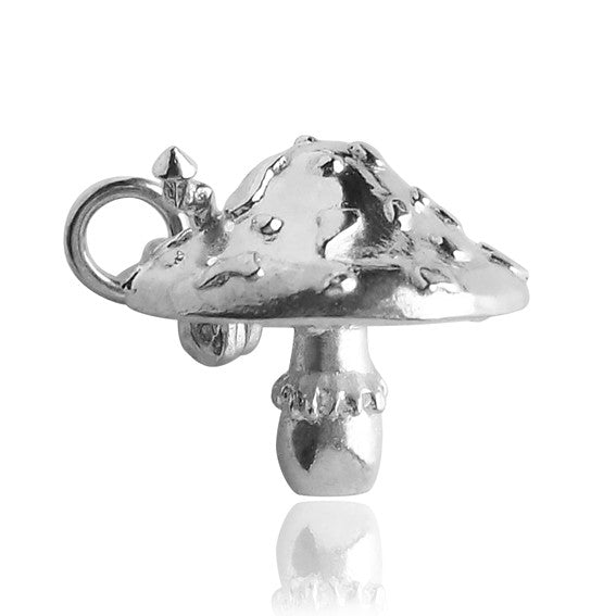 Sterling silver toadstool charm on a white background