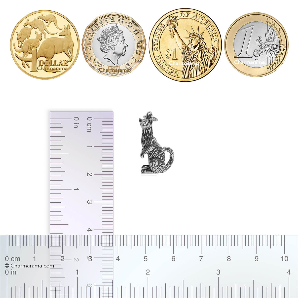 Sterling silver ferret charm with coins and ruler for scale on a white background