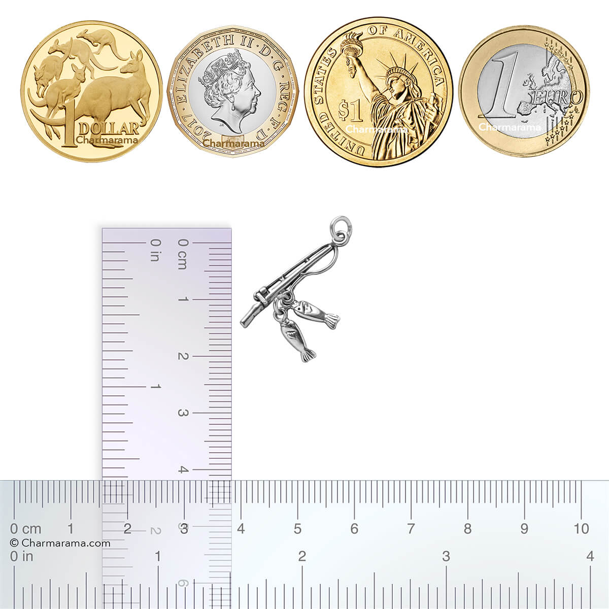 Sterling silver fishing rod and two fish charm with coins and ruler for scale on a white background