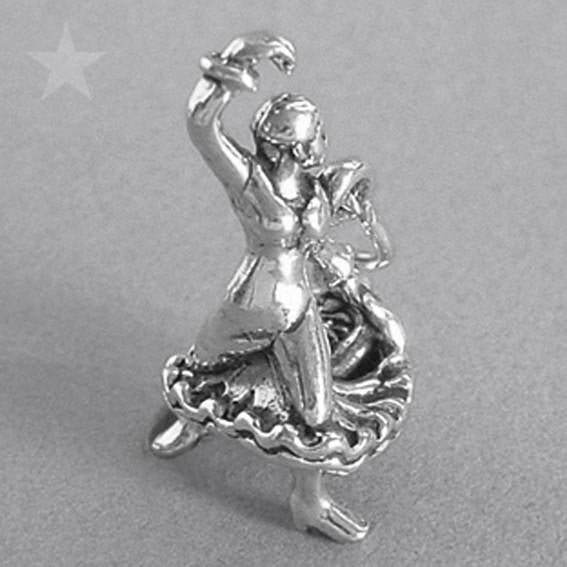 Sterling silver flamenco dancer charm on a grey background