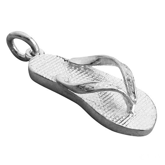 Sterling silver flip flop charm on a white background