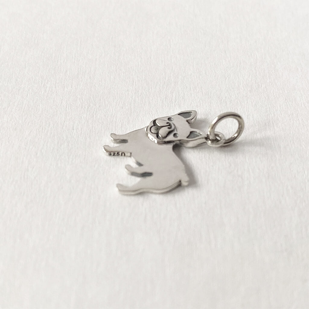 Sterling silver French bulldog charm on a white background