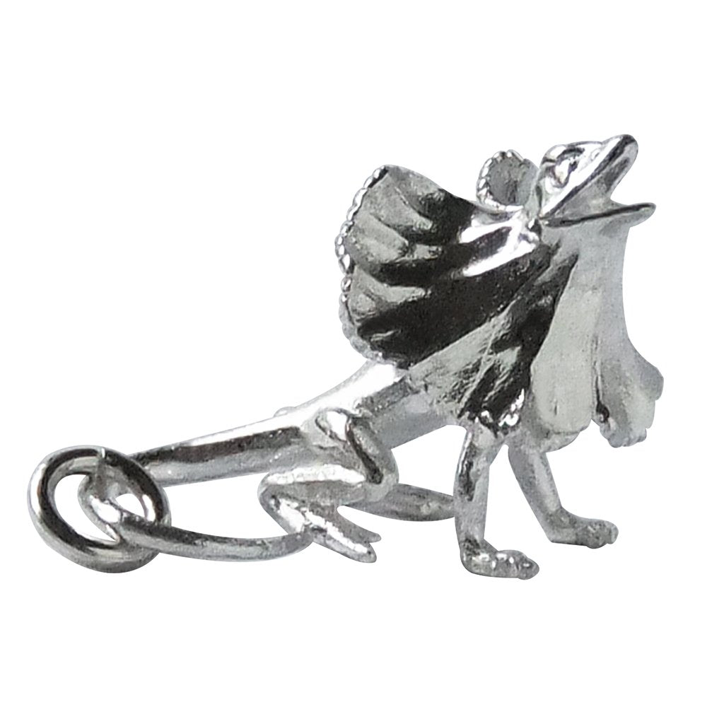 Sterling silver frill necked lizard charm on a white background