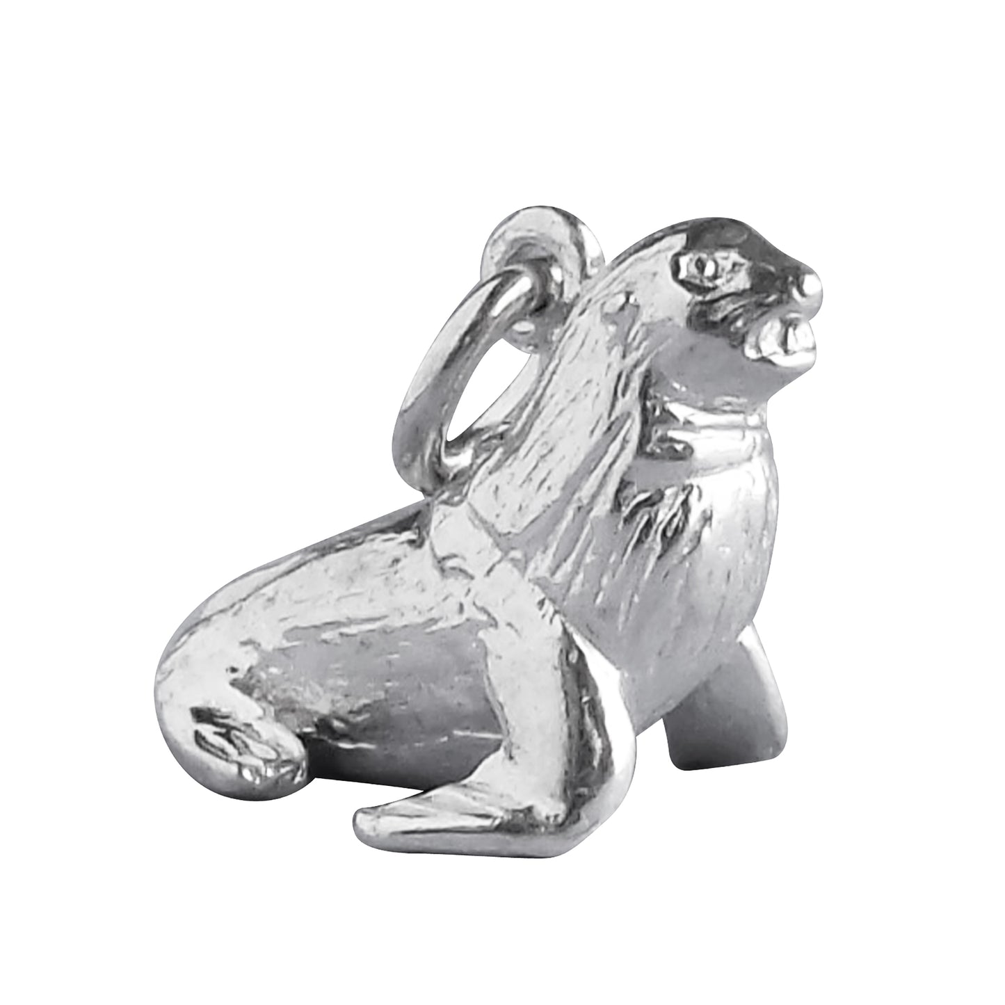 Sterling silver fur seal charm on a white background