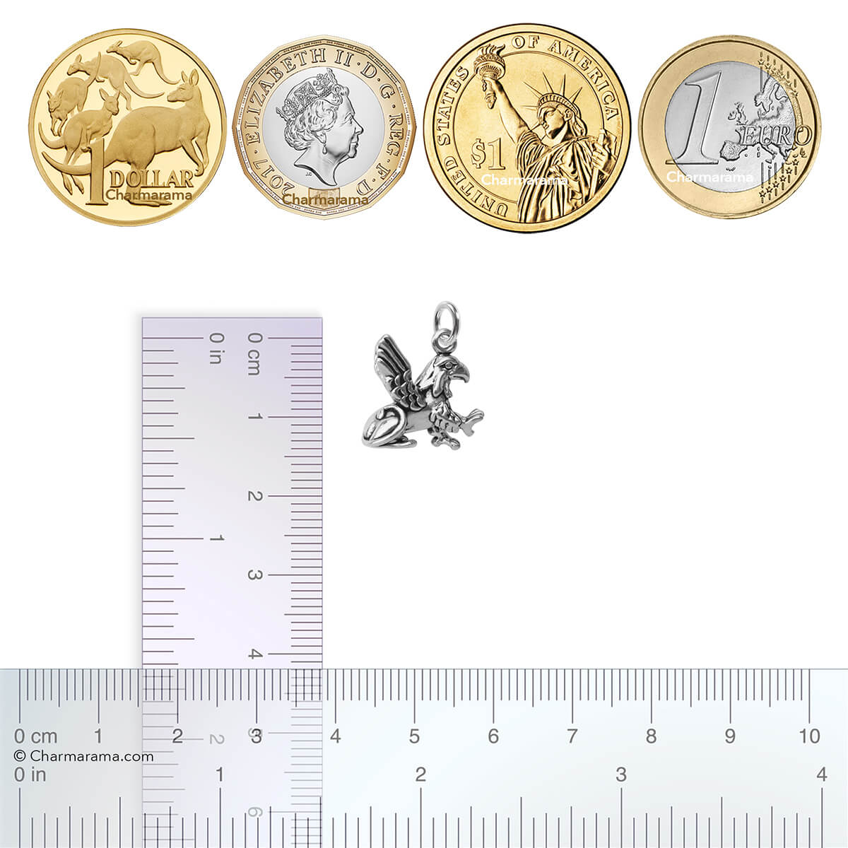 Sterling silver griffin charm with coins and ruler on a white background
