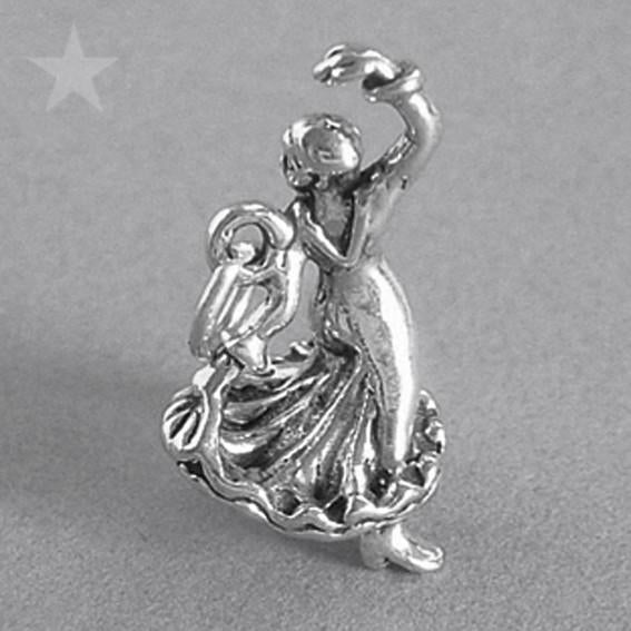 Sterling silver flamenco dancer charm on a grey background