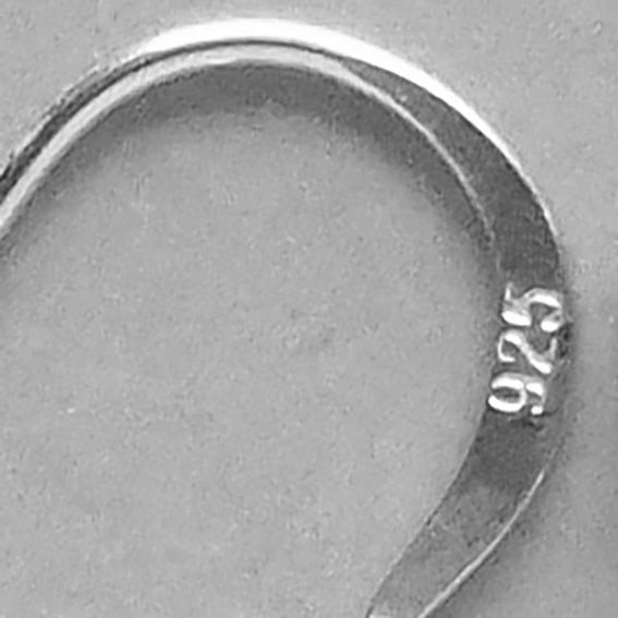 Sterling silver ear hook close up