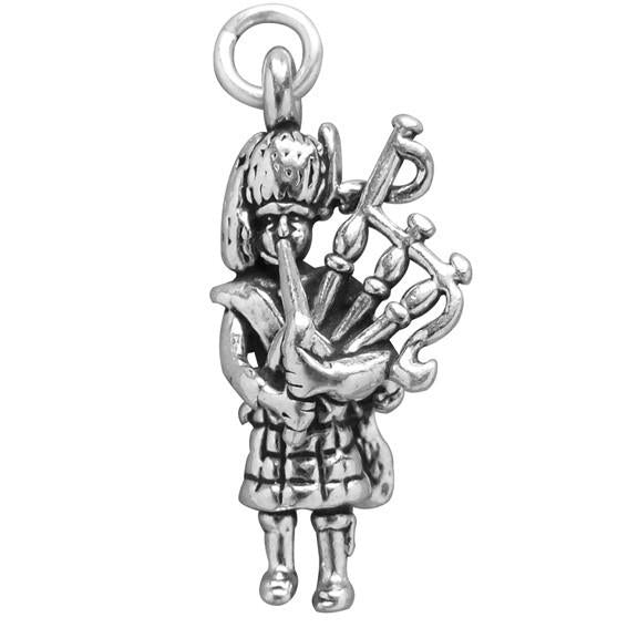 silver bagpiper charm on a white background