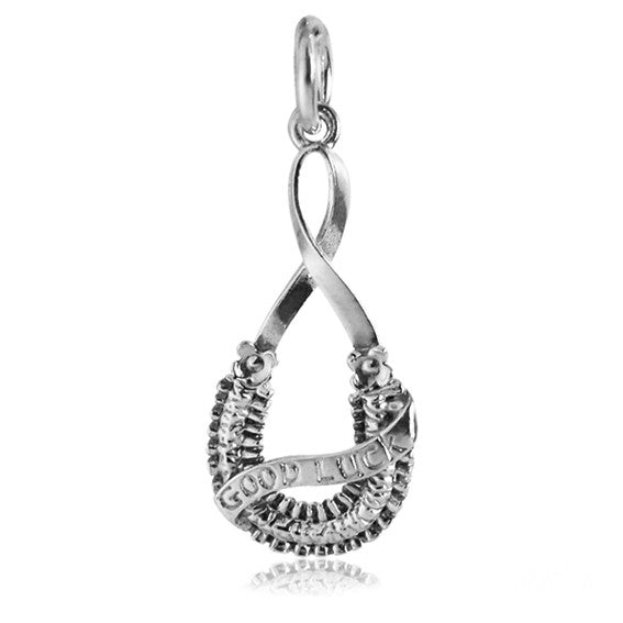 bridal horseshoe charm on a white background