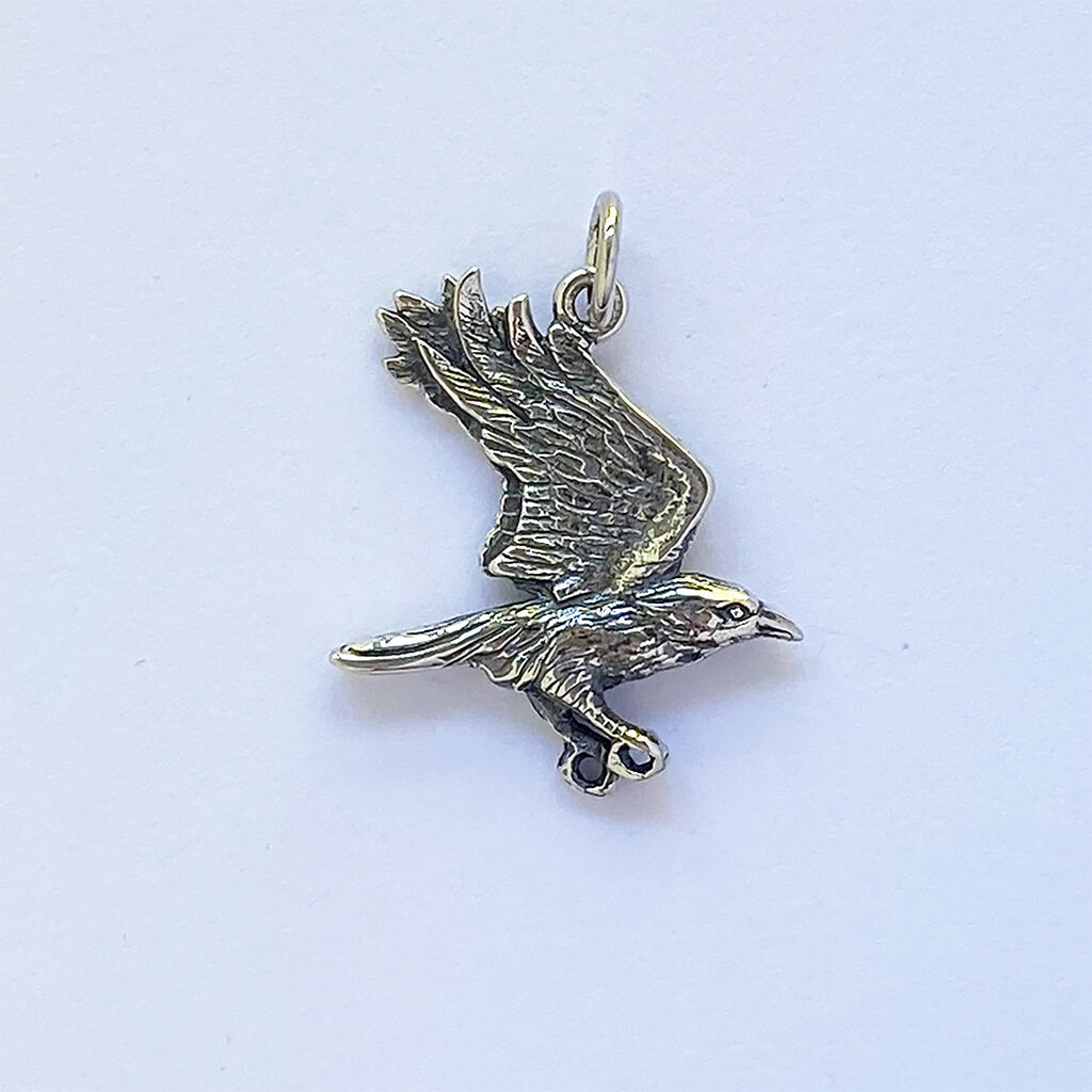 crow in flight pendant in sterling silver