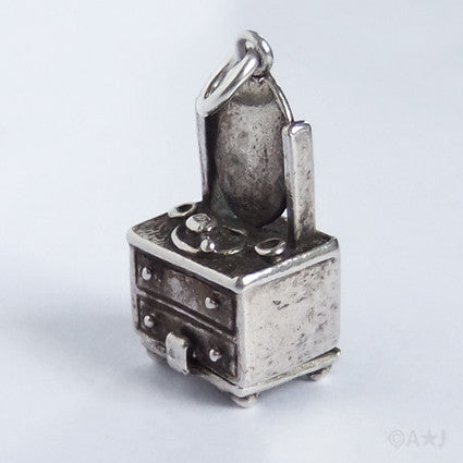 Vintage Nuvo dressing table charm pendant opens to tortoise