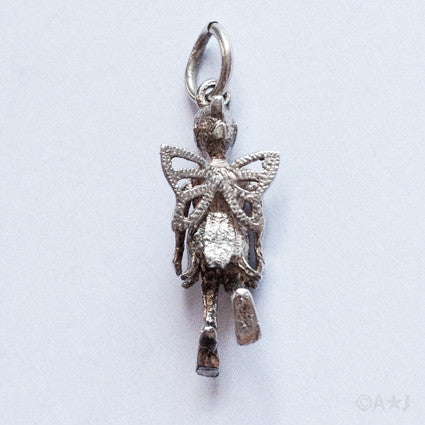 Vintage moving mechanical silver flower fairy charm