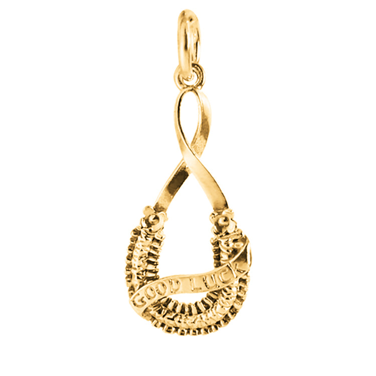gold bridal horseshoe charm on a white background