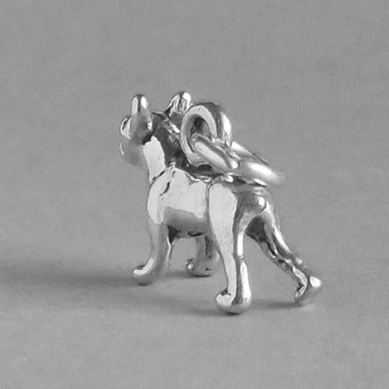 Tiny silver Boston Terrier Dog Charm on a grey background
