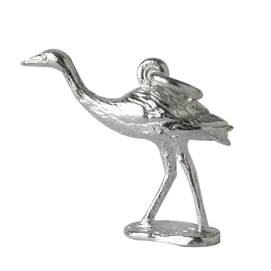 Silver brolga charm on a white background