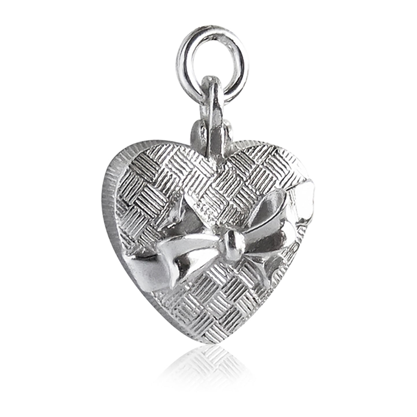 silver heart shaped chocolate box charm on a white background