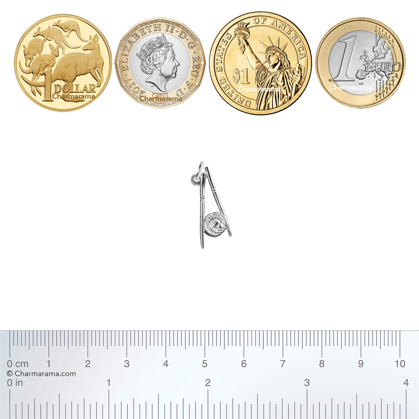 silver chopsticks and sushi charm with coins and ruler for scale on white background