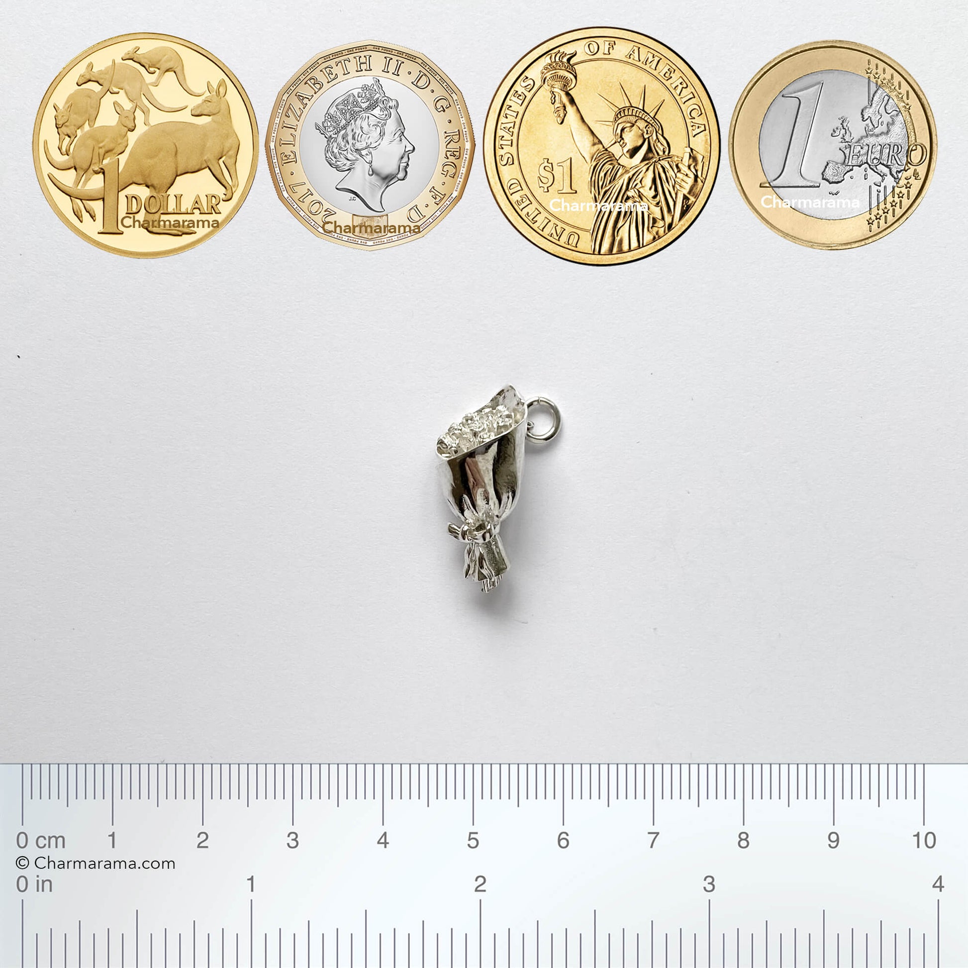 silver bouquet of roses charm with coins and ruler for scale