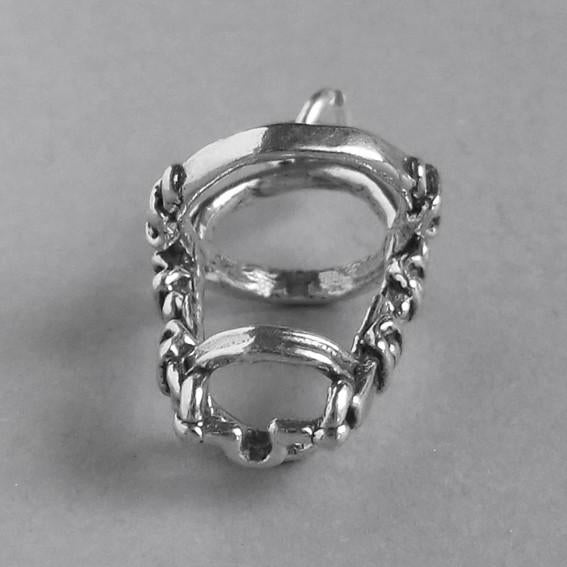 sterling silver horse bridle charm on a grey background
