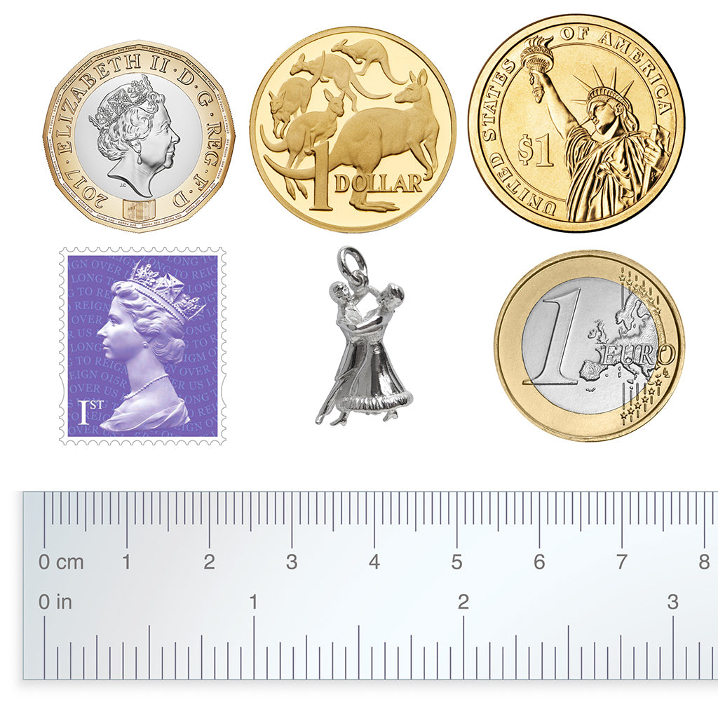 ballroom dance charm size guide with coins ruler and British stamp