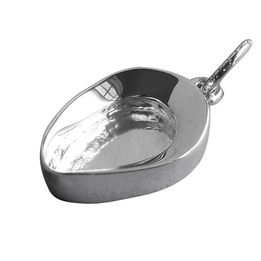sterling silver bedpan charm on a white background